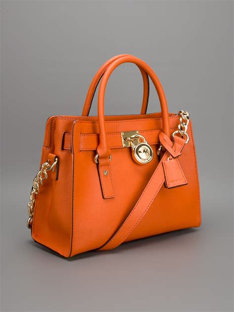 sac a main michael kors orange|Michael Kors snakeskin bag.